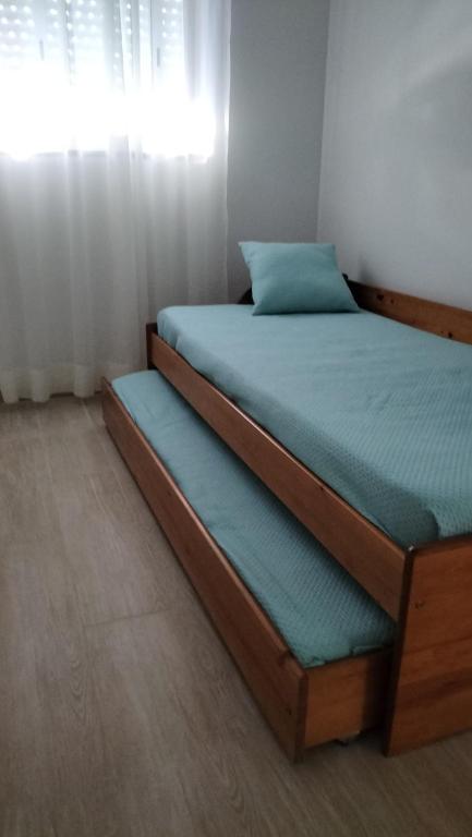 a pair of beds in a room at AL - Bino - T3 in Carregosa