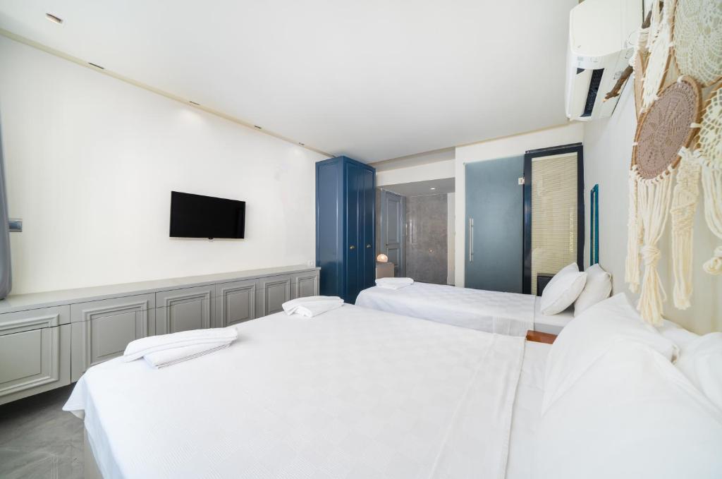 Postel nebo postele na pokoji v ubytování VERA HOTEL KAŞ