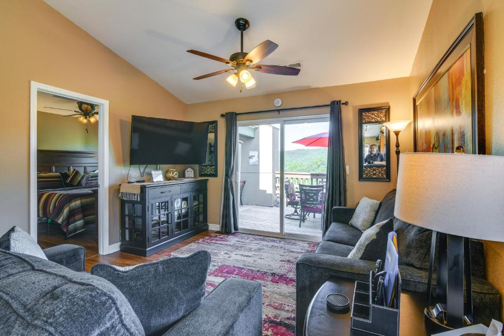 a living room with two couches and a tv at Near Silver Dollar City! Condo w/ Hot Tub & Lake in Branson