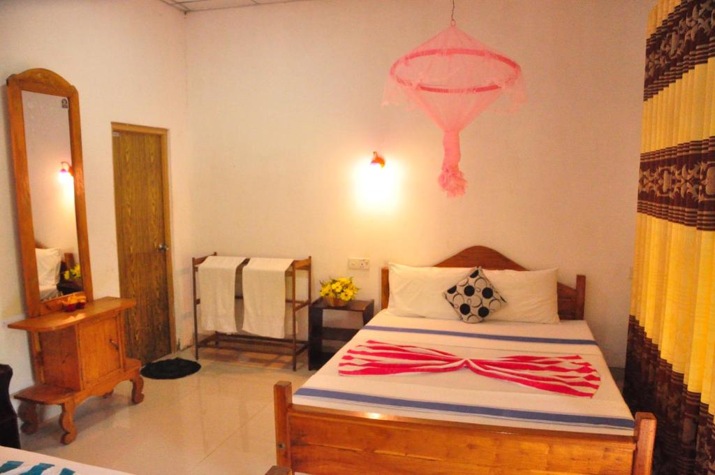 Postel nebo postele na pokoji v ubytování Horizon Resort & Hostel Sigiriya