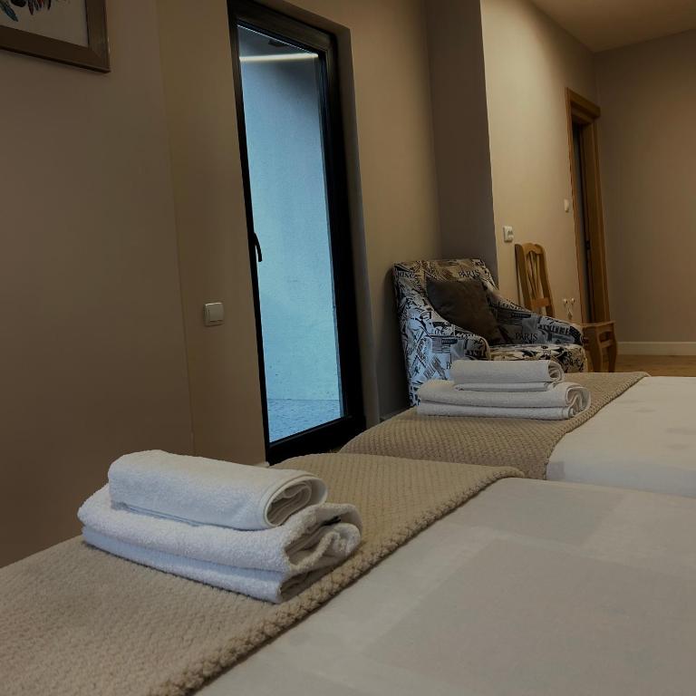 Postel nebo postele na pokoji v ubytování Boutique hotel mestia
