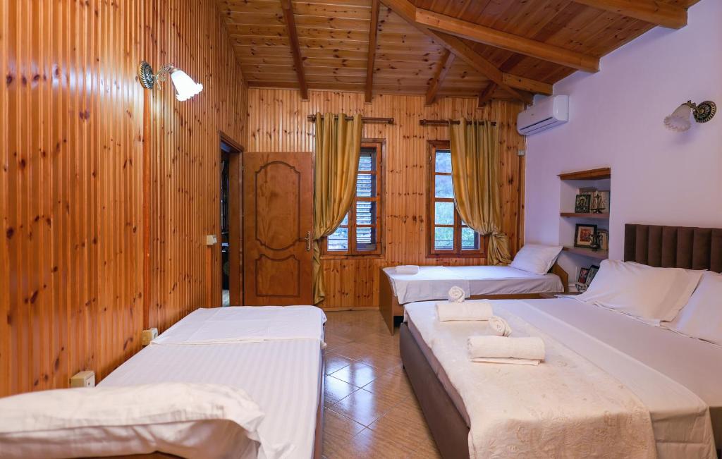Postel nebo postele na pokoji v ubytování DD Villa 2