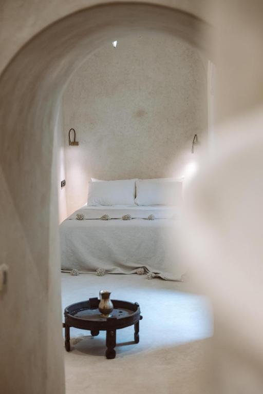 Postel nebo postele na pokoji v ubytování Riad Le Sable Vert