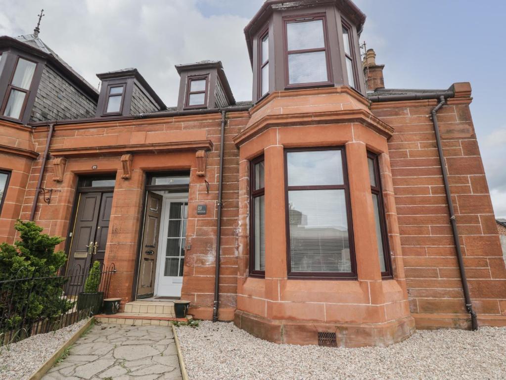 an old brick house with windows on top of it at Willowbank in Ayr