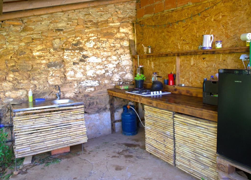 Kuchyň nebo kuchyňský kout v ubytování Tree house da Lage