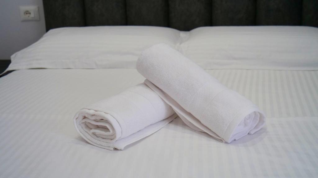 Postel nebo postele na pokoji v ubytování Bar Restorant Hotel Rama