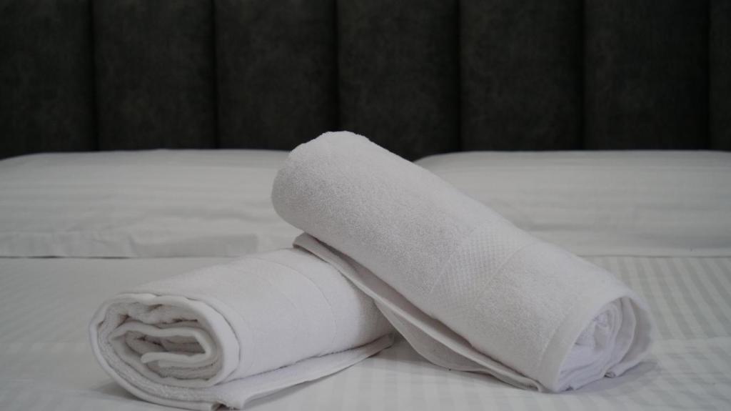 Postel nebo postele na pokoji v ubytování Bar Restorant Hotel Rama