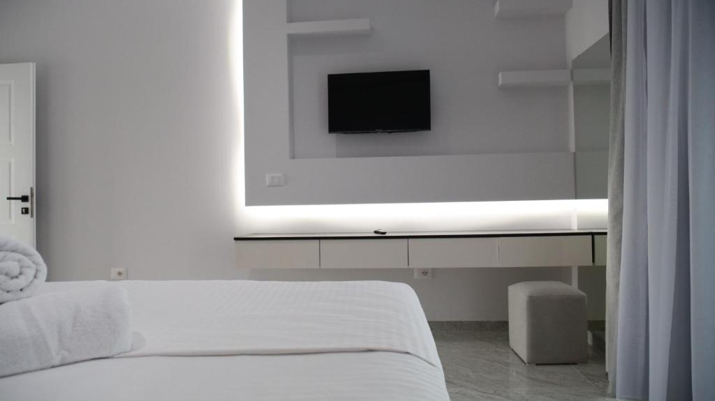 Postel nebo postele na pokoji v ubytování Bar Restorant Hotel Rama