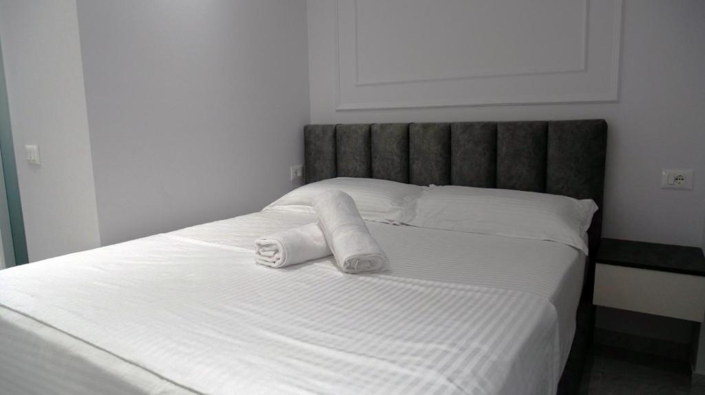 Postel nebo postele na pokoji v ubytování Bar Restorant Hotel Rama