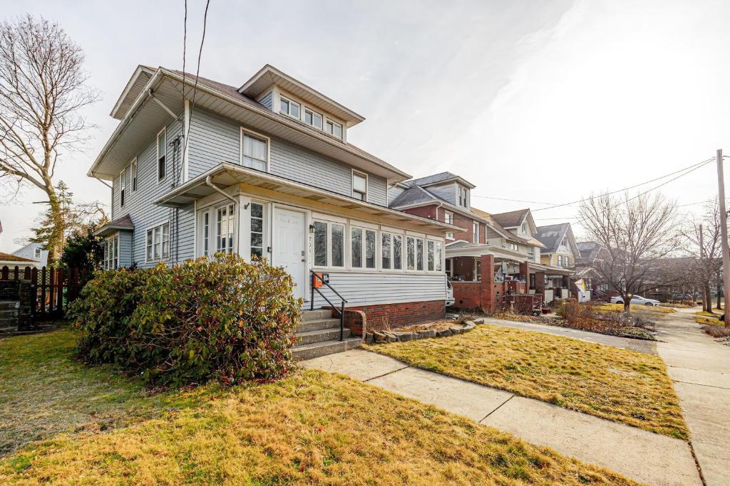 a large house on a street with at Unit 2 at Oilgate at Oakdale in Akron