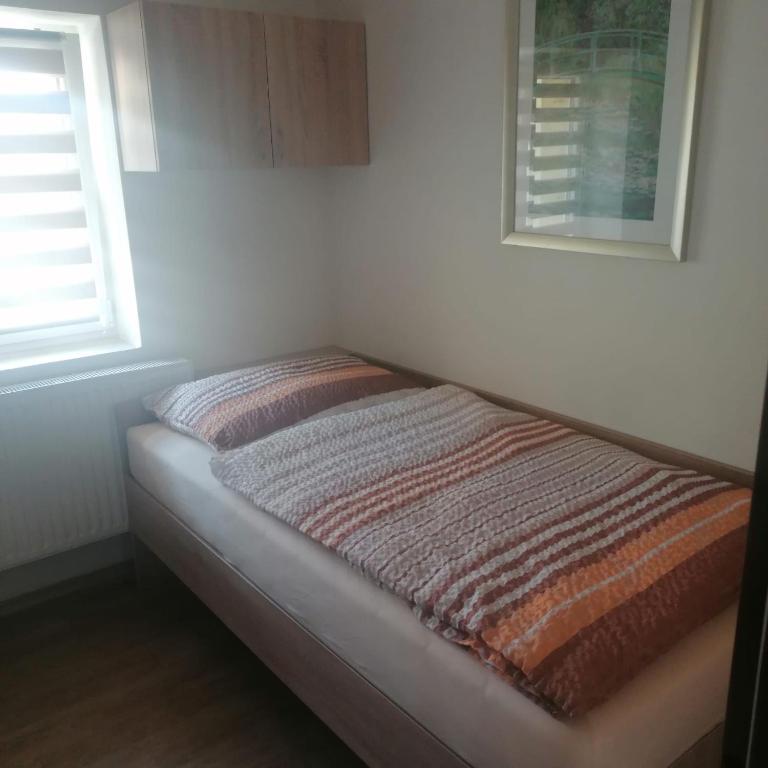 Postel nebo postele na pokoji v ubytování Ubytování Louny