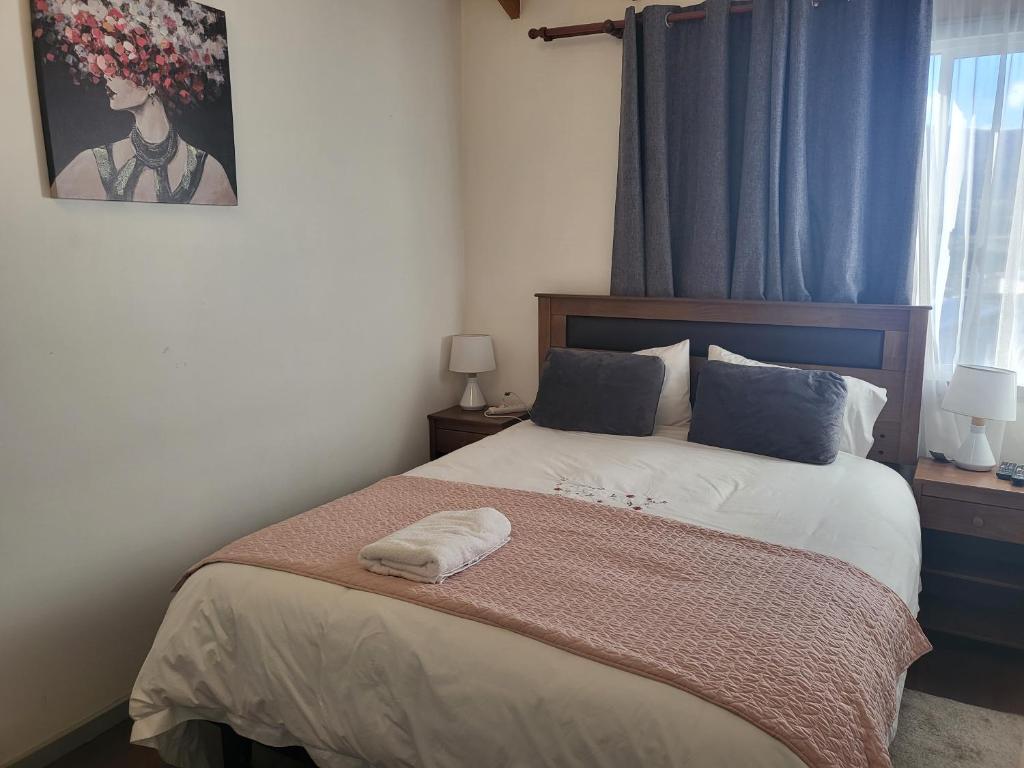 Letto o letti in una camera di Hostal Uruz