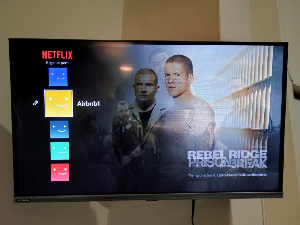TV a/nebo společenská místnost v ubytování Tacna Guest House