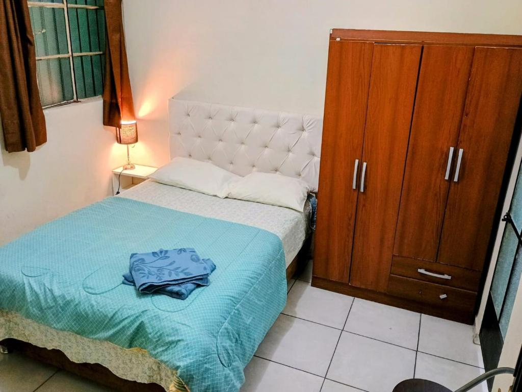 Postel nebo postele na pokoji v ubytování Tacna Guest House