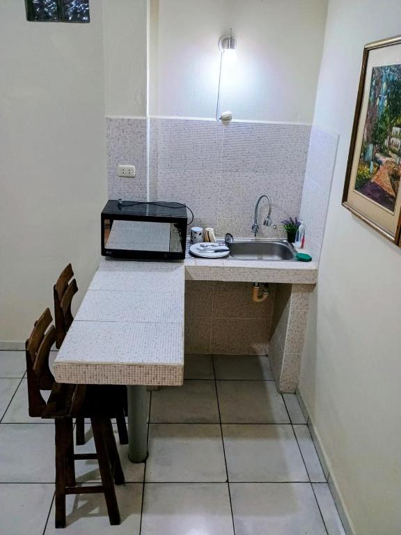 Kuchyň nebo kuchyňský kout v ubytování Tacna Guest House