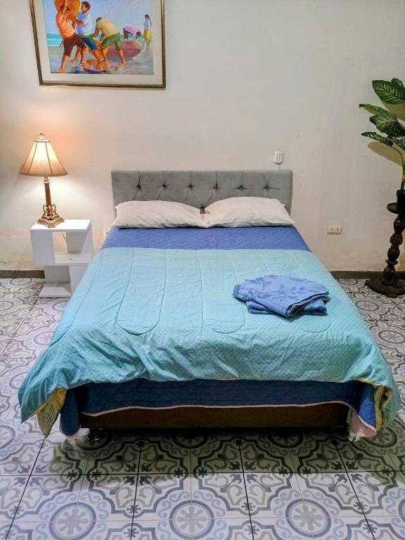 Postel nebo postele na pokoji v ubytování Tacna Guest House