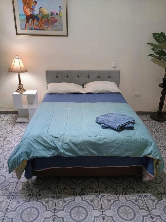 Postel nebo postele na pokoji v ubytování Tacna Guest House