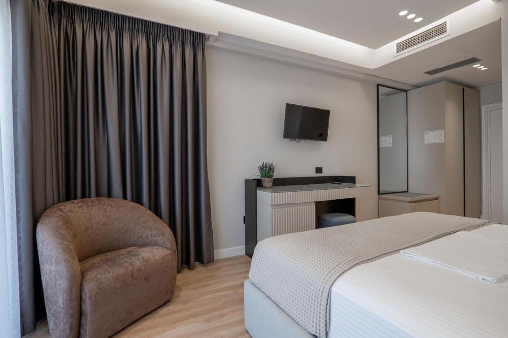 Postel nebo postele na pokoji v ubytování AMI MAR Hotel