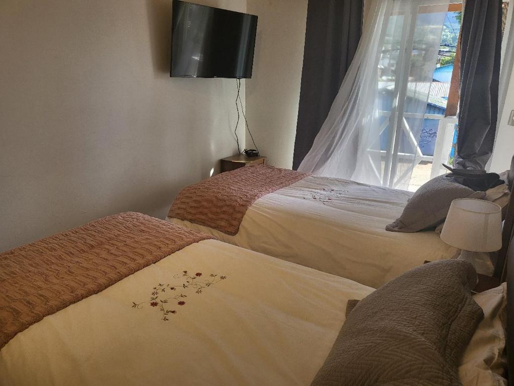 Letto o letti in una camera di Hostal Uruz