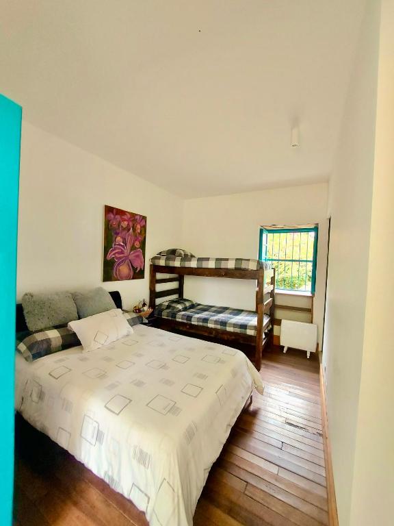 Postel nebo postele na pokoji v ubytování Hacienda Tocarema