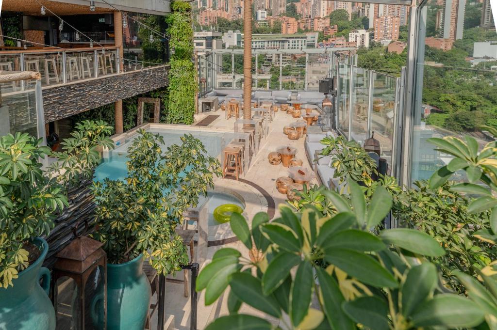 a view from the top of a building with plants at The Charlee Hotel in Medellín