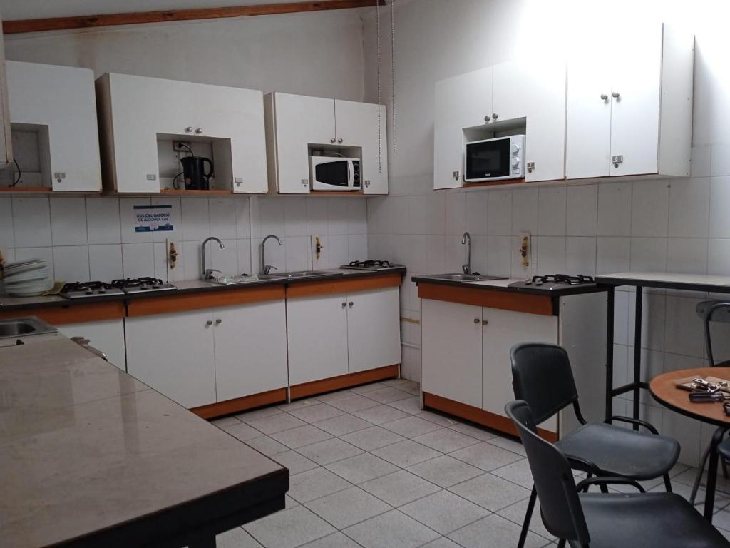 Kuchyň nebo kuchyňský kout v ubytování Homerent