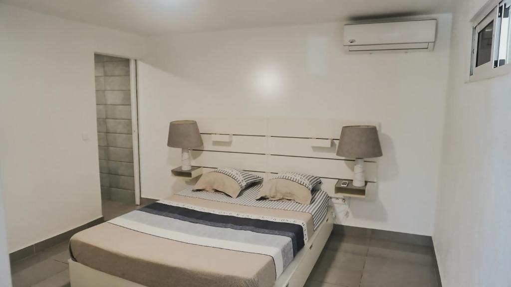 Postel nebo postele na pokoji v ubytování DV Real Philoxénia