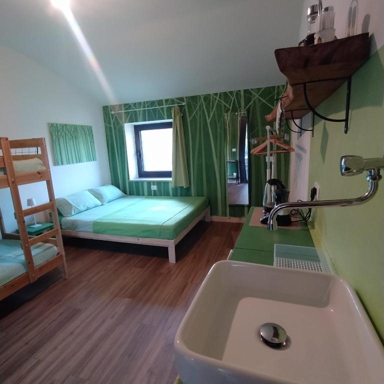 Postel nebo postele na pokoji v ubytování BB6 di Elena e Roberto