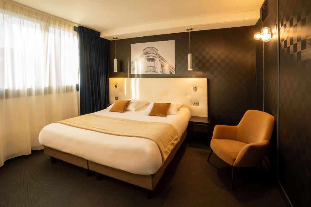 Postel nebo postele na pokoji v ubytování Best Western Hotel Le Quercy