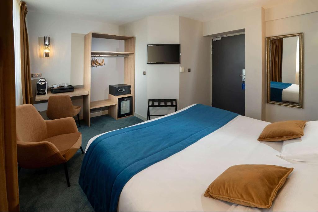 Postel nebo postele na pokoji v ubytování Best Western Hotel Le Quercy