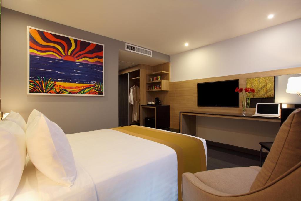TV a/nebo společenská místnost v ubytování Nova Express Pattaya Hotel