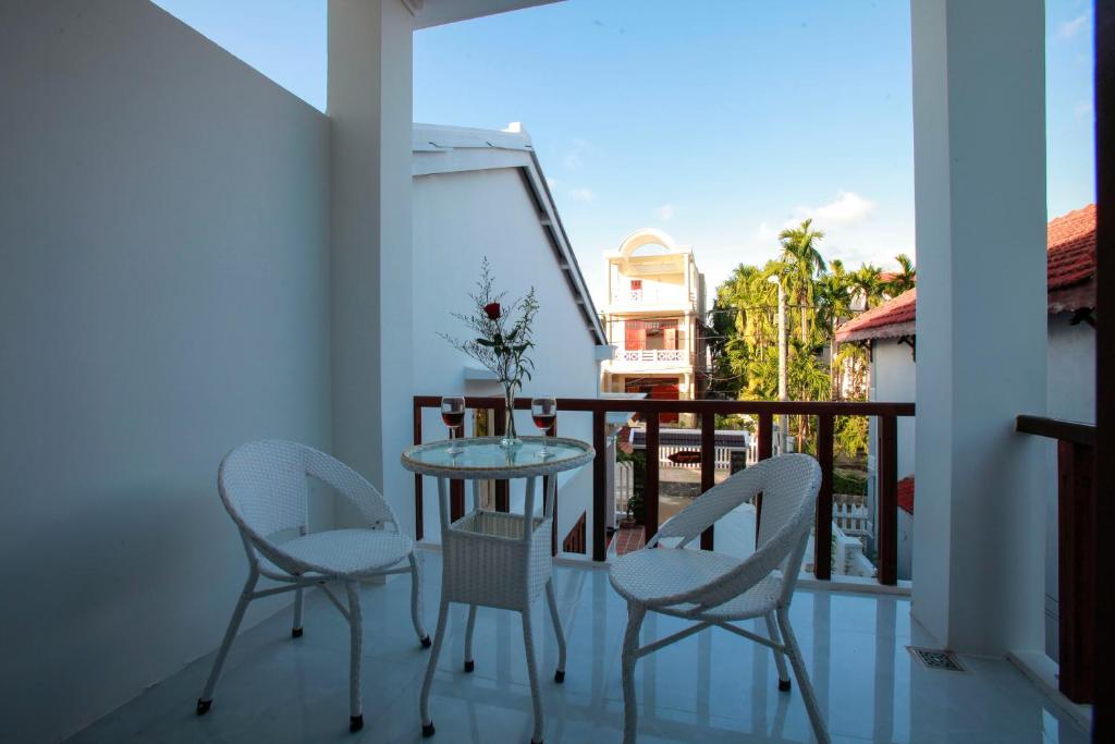 Rõdu või terrass majutusasutuses Coconut Garden Homestay