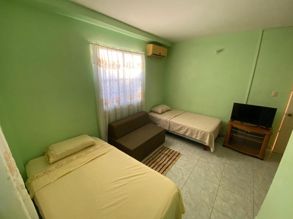 Postel nebo postele na pokoji v ubytování Runnyaway Inn