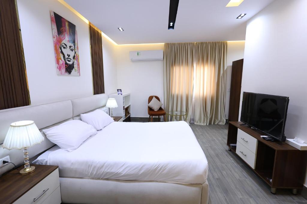 TV a/nebo společenská místnost v ubytování Pyramids Sunshine Hotel