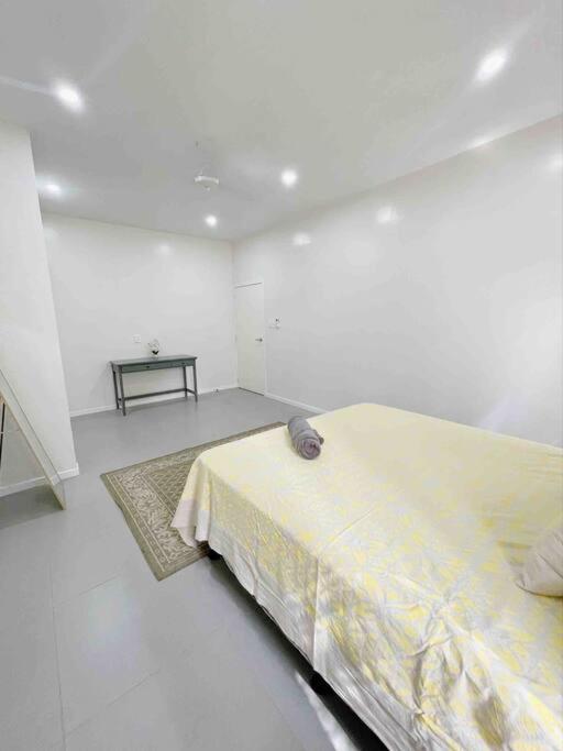 Postel nebo postele na pokoji v ubytování TnT Home