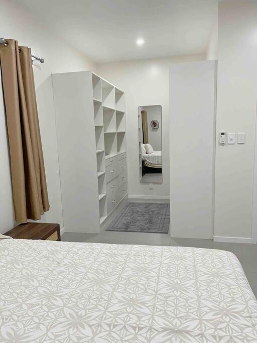 Postel nebo postele na pokoji v ubytování TnT Home