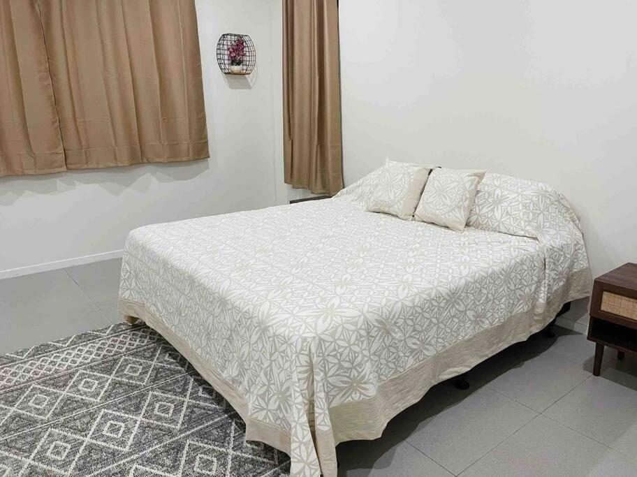 Postel nebo postele na pokoji v ubytování TnT Home