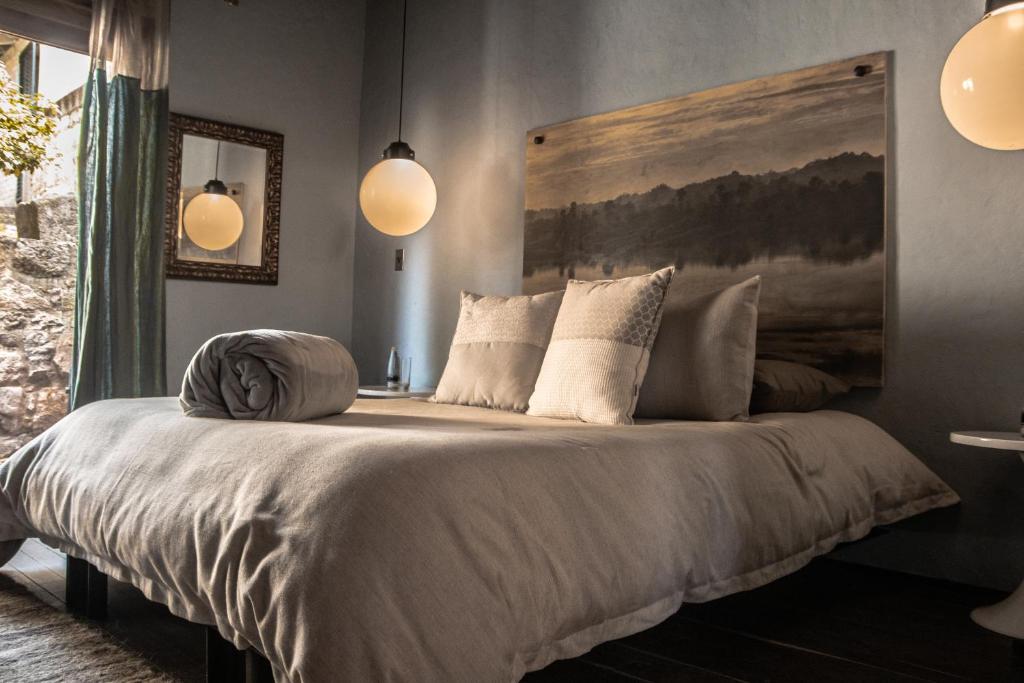 Postel nebo postele na pokoji v ubytování Hotel Dios