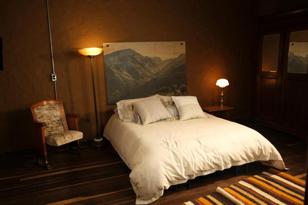 Postel nebo postele na pokoji v ubytování Hotel Dios
