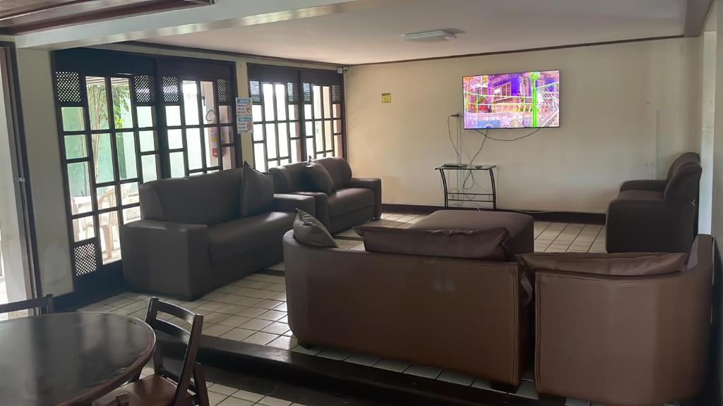 TV a/nebo společenská místnost v ubytování Hostel Jardim