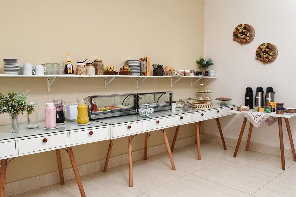 A cozinha ou cozinha compacta de Pousada Rosa dos Ventos Juquehy