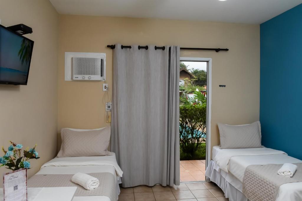 Pousada Rosa dos Ventos Juquehy - Standard Quadruple Room
