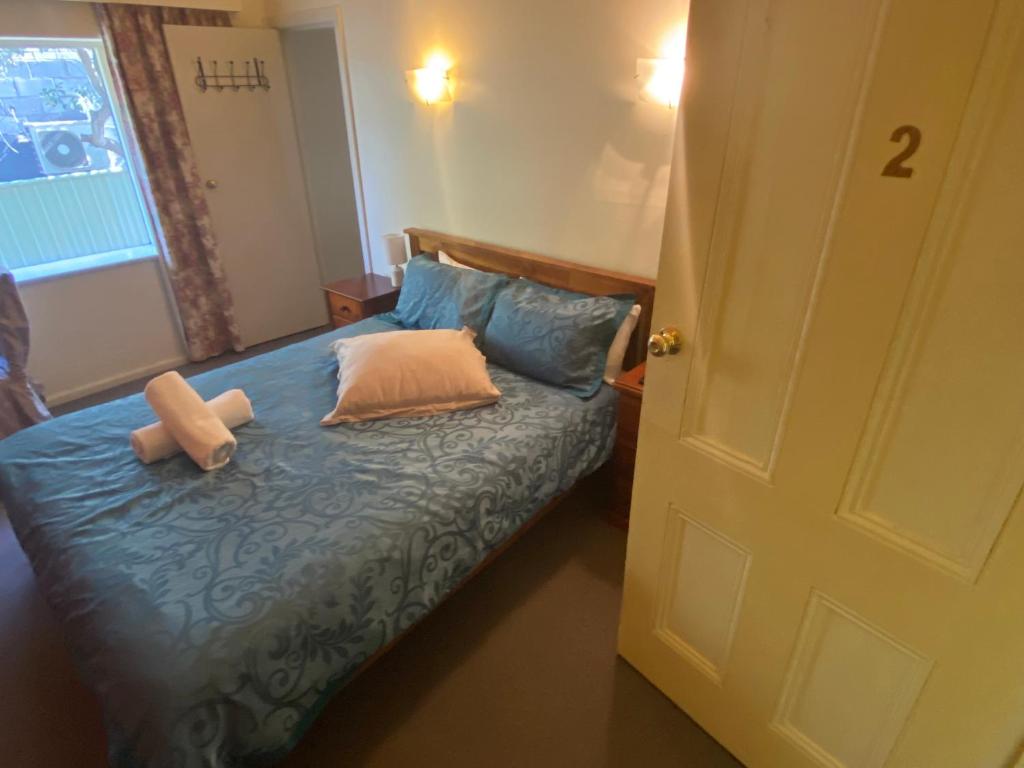 Letto o letti in una camera di Ellstanmor Guesthouse Cooma