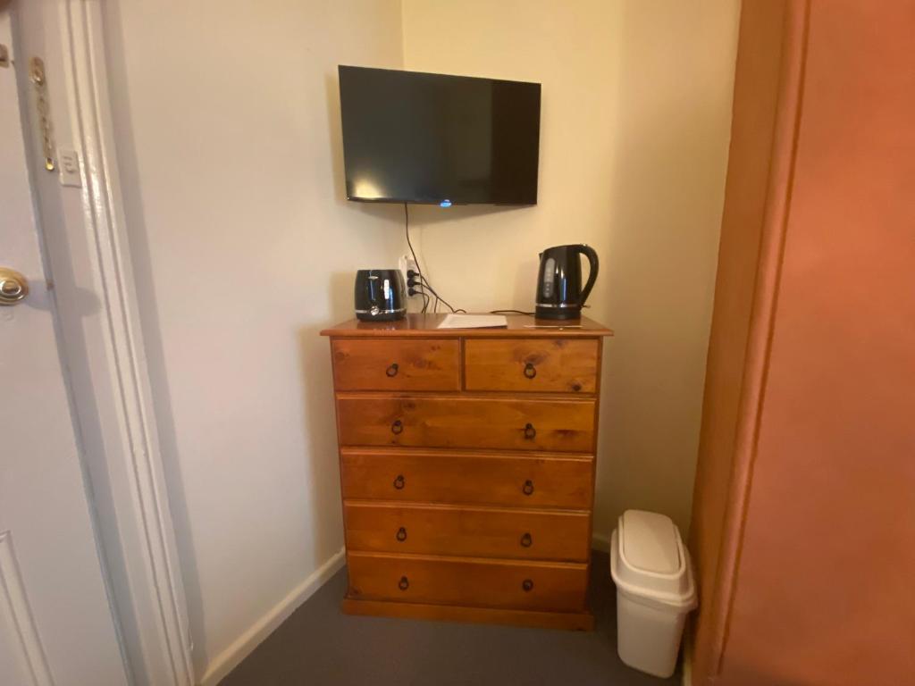 TV o dispositivi per l'intrattenimento presso Ellstanmor Guesthouse Cooma