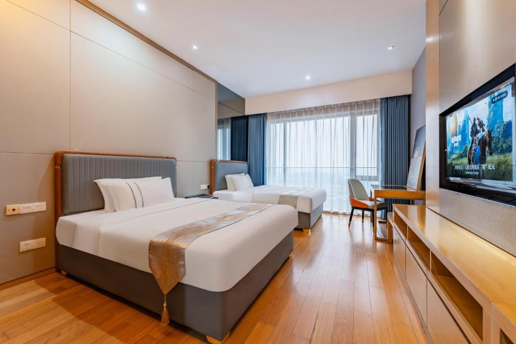 Yicheng Pazhou Poly World Trade Centre Apartment - Deluxe Twin Room - Ciudadano Chino Continente