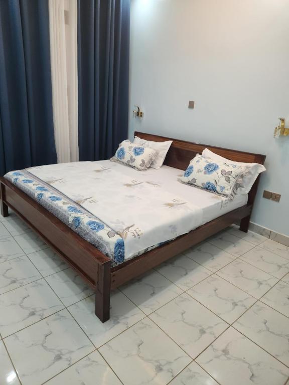 Ένα ή περισσότερα κρεβάτια σε δωμάτιο στο Care house