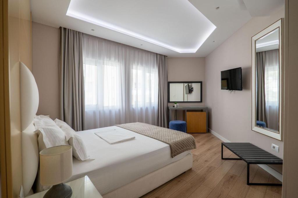 TV a/nebo společenská místnost v ubytování AMI MAR Hotel