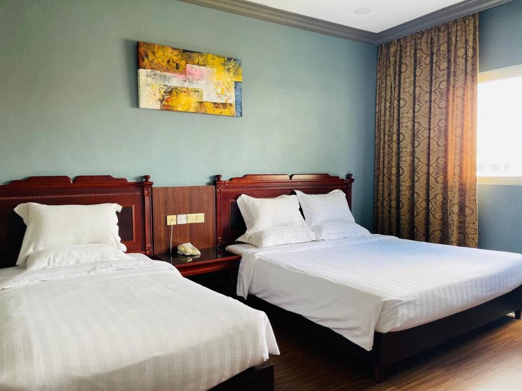 Postel nebo postele na pokoji v ubytování Penview Hotel