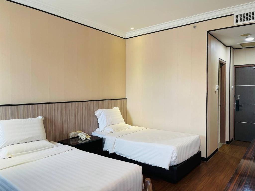 Postel nebo postele na pokoji v ubytování Penview Hotel