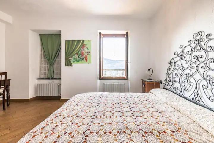 A bed or beds in a room at Bed & Breakfast L'erica